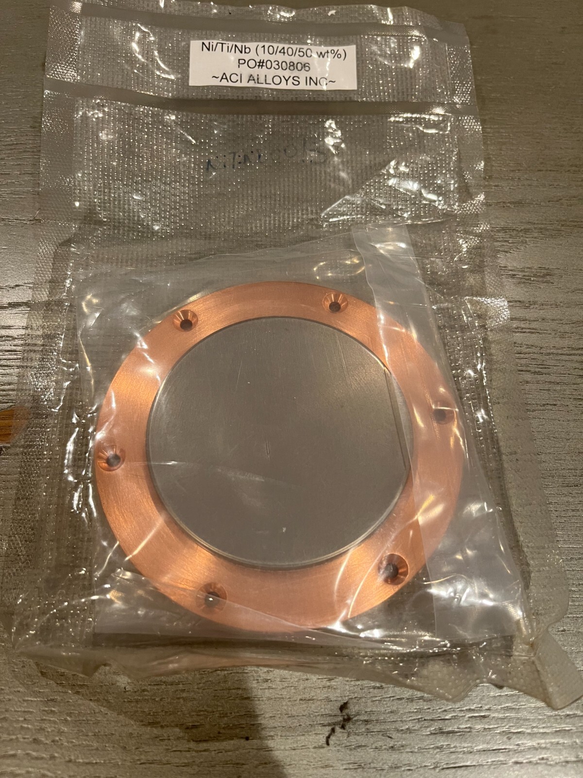 Sputtering Target, Ni10Ti40Nb50 wt %, approx 3″x.25″w/ 4″ copper backing plate