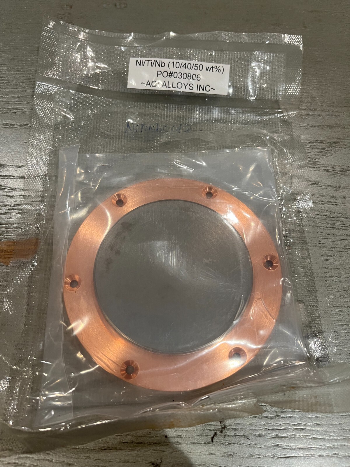 Sputtering Target, Ni10Ti40Nb50 wt %, approx 3″x.25″w/ 4″ copper backing plate