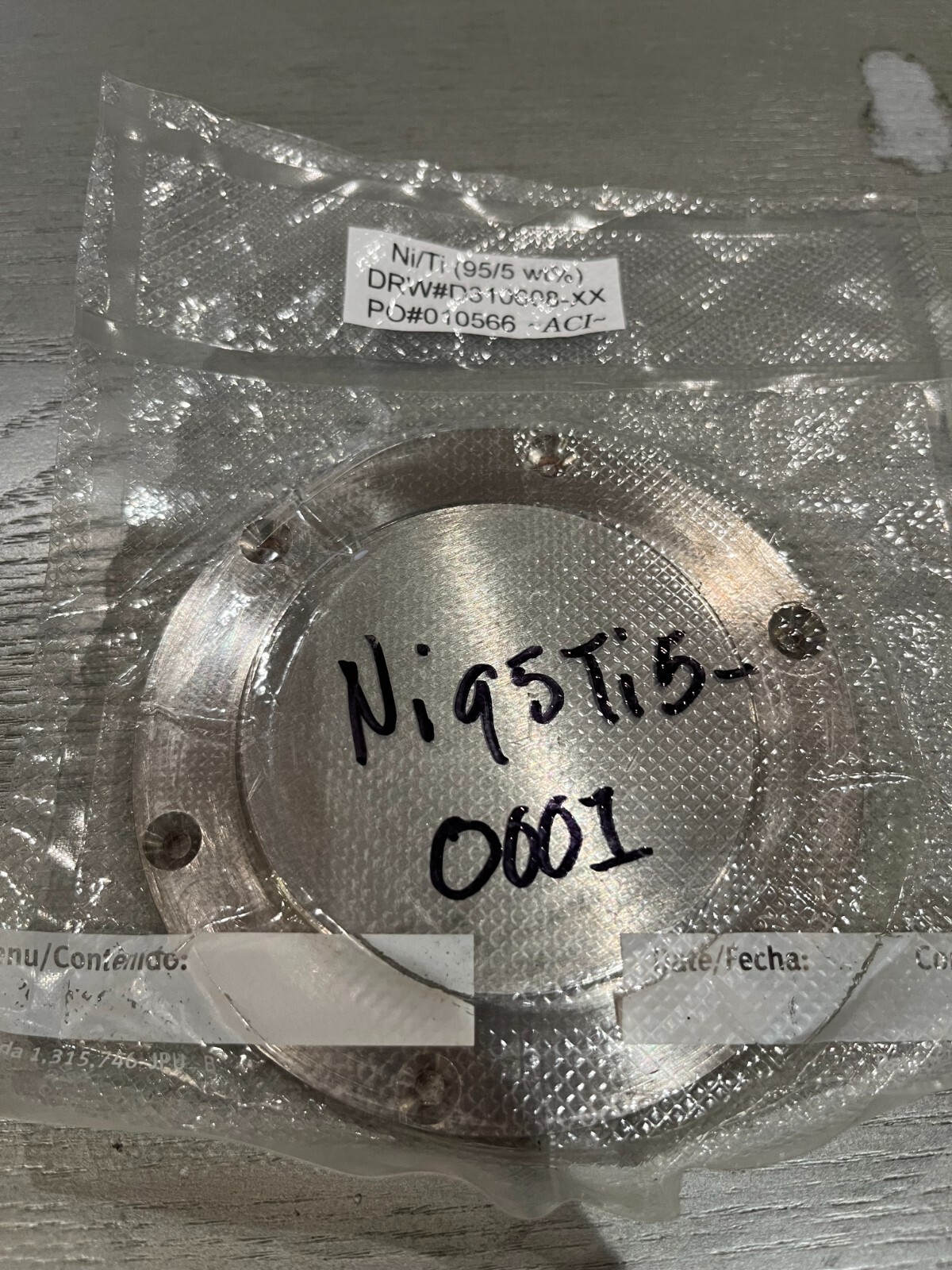 Sputtering Target, Ni95Ti5 wt %, approximately 3″x.25″w/ 4″ copper backing plate