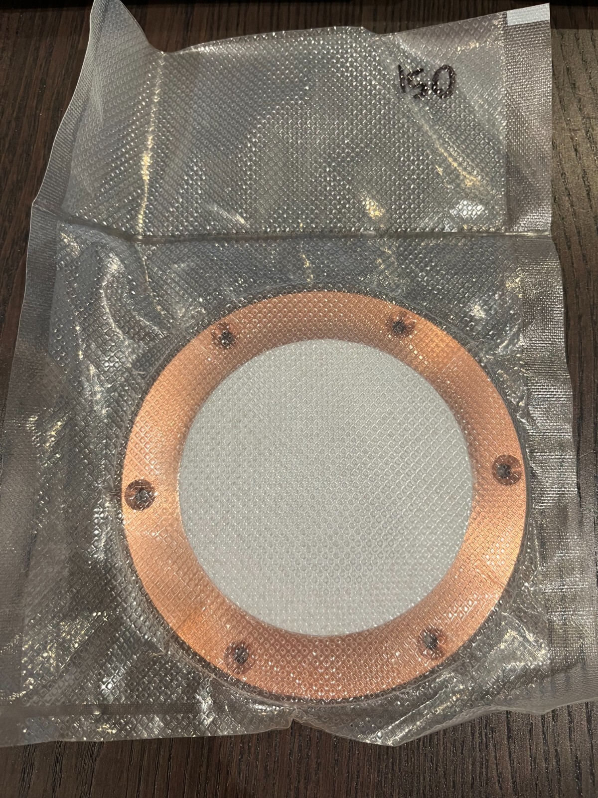 Sputtering Target, KTaOx approx 3″x.25″w/ 4″ copper backing plate