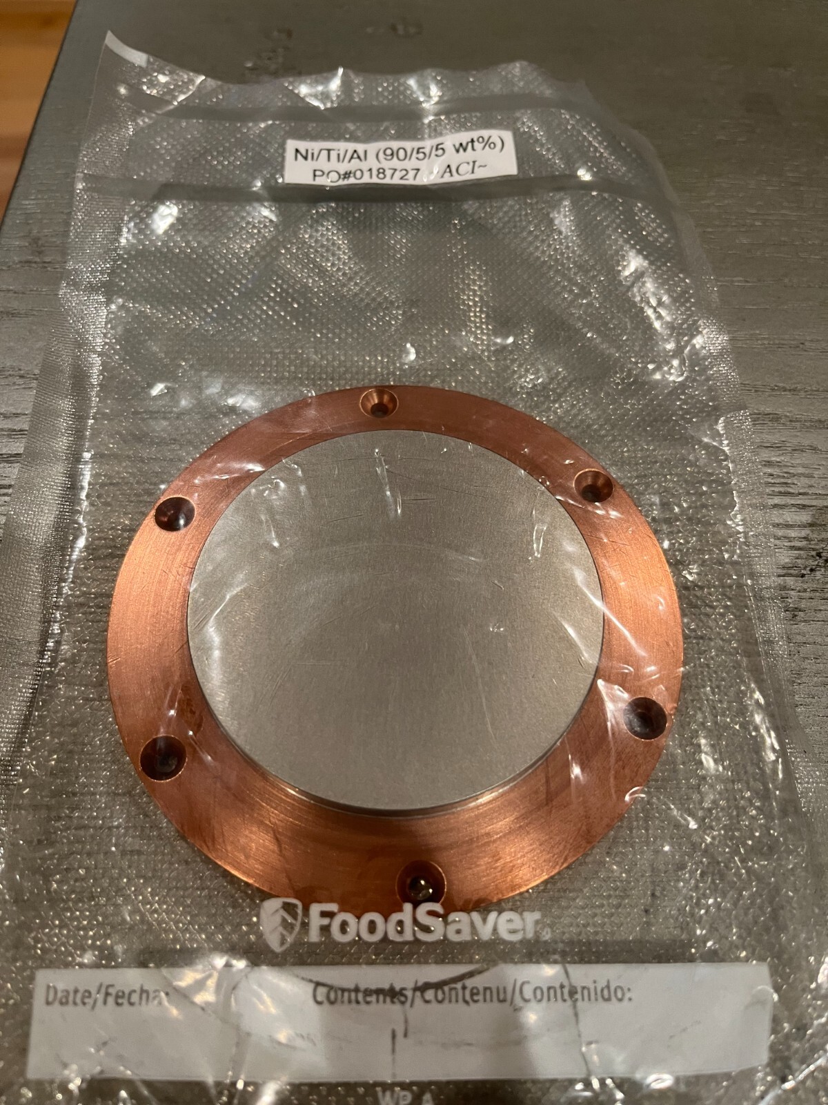 Sputtering Target, Ni90Ti5Al5 wt %, approx 3″x.25″w/ 4″ copper backing plate