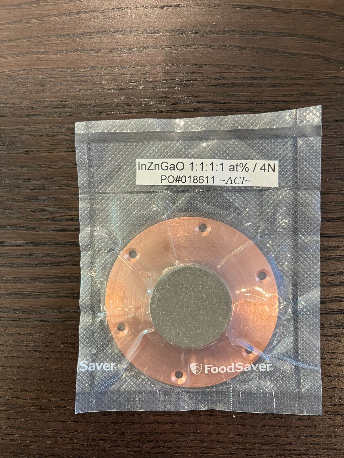Sputtering Target, InZnGaO 1:1:1:1 at%1.5″x0.250″ bonded to Copper backing plate