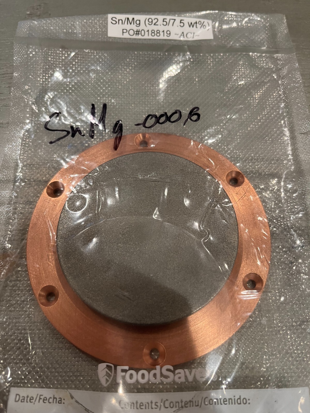 Sputtering Target, Sn92.5Mg7.5 wt %, approx 3″x.25″w/ 4″ copper backing plate