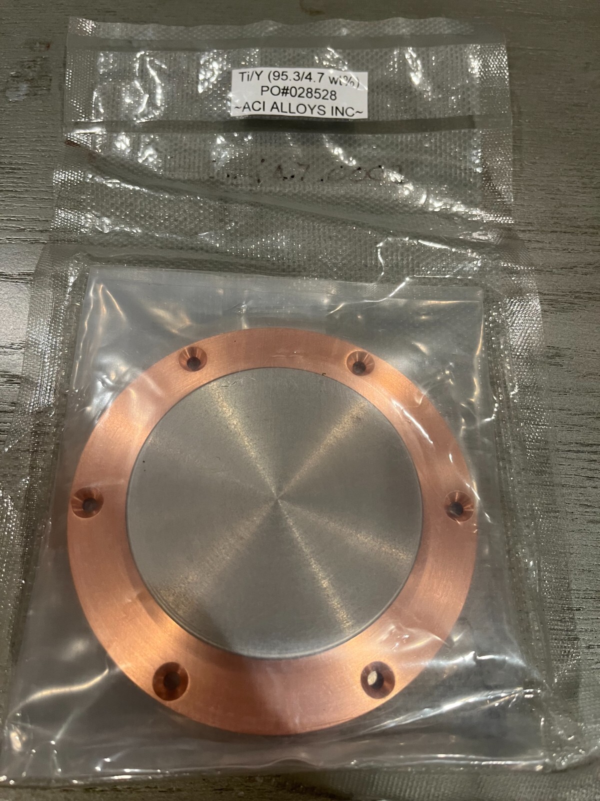 Sputtering Target, Ti95.3Y4.7 wt %, approx 3″x.25″w/ 4″ copper backing plate