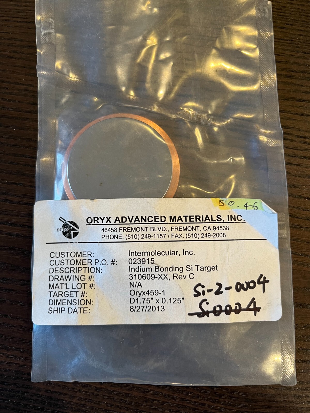 Sputtering Target, Si, 1.75″ x .125″ w/ copper backing plate